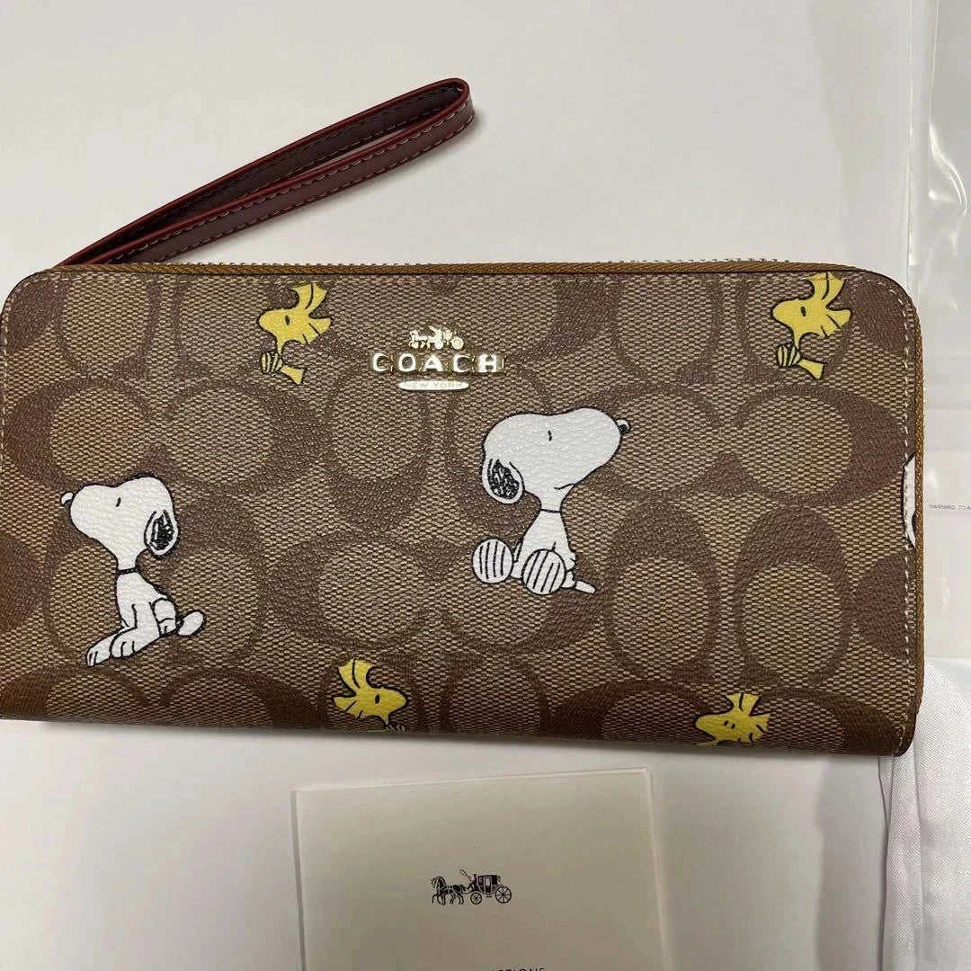 COACH x Peanuts Long Zip Around Wallet Snoopy Woodstock Khaki Signature Canvas